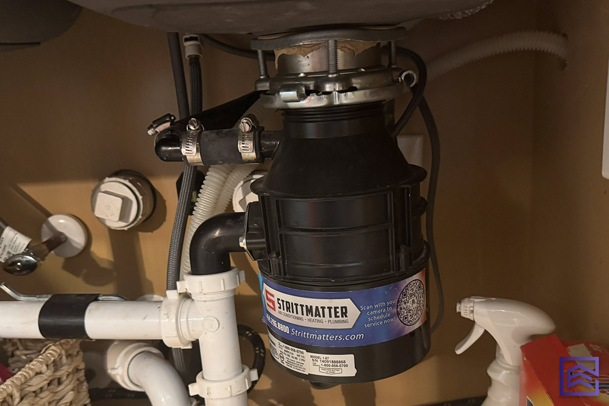 garbage disposal install and repairs by Lynnmar Services